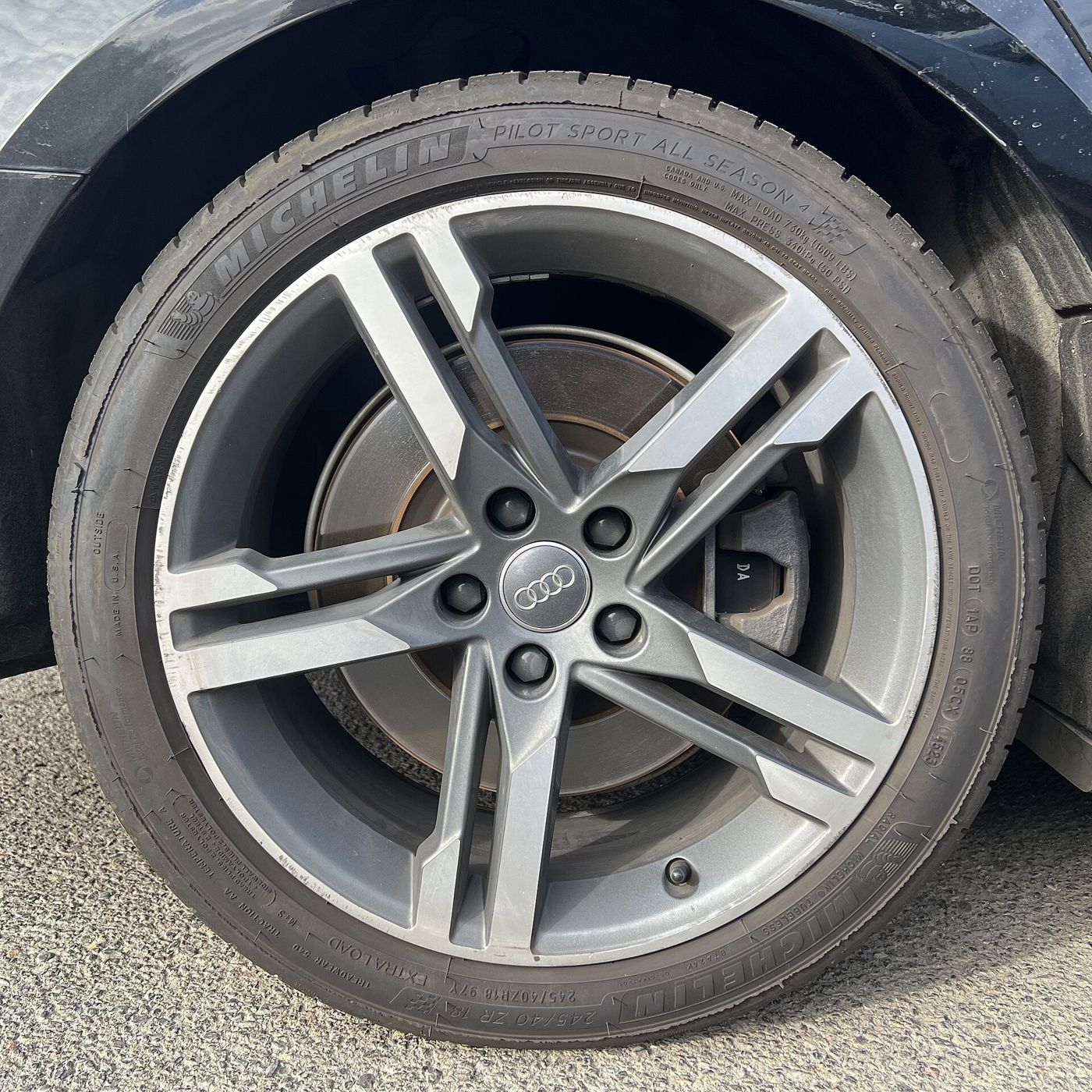 Michelin Pilot Sport All Season tire on an Audi alloy wheel, close-up