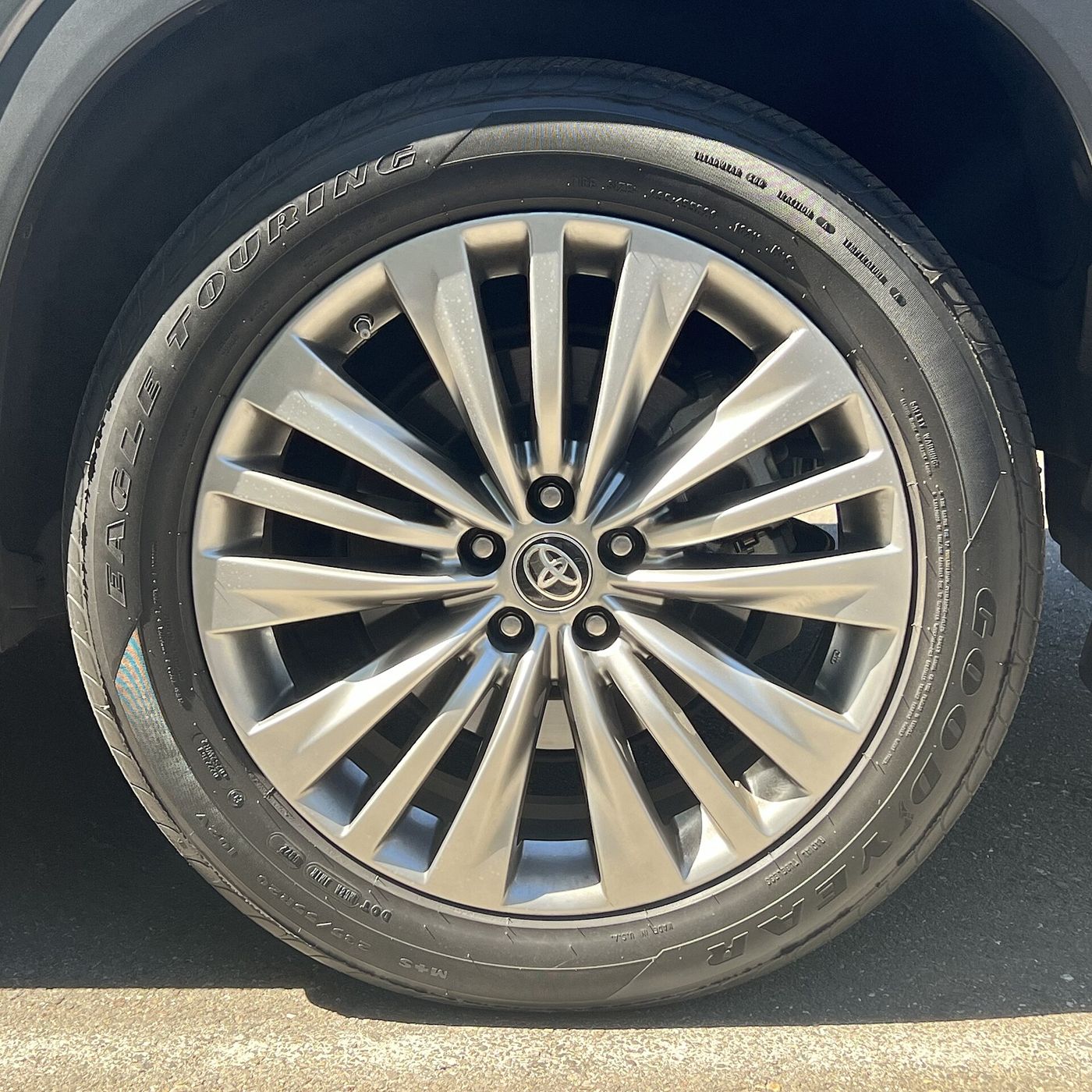 Goodyear Eagle Touring tire on a Toyota alloy wheel, close-up