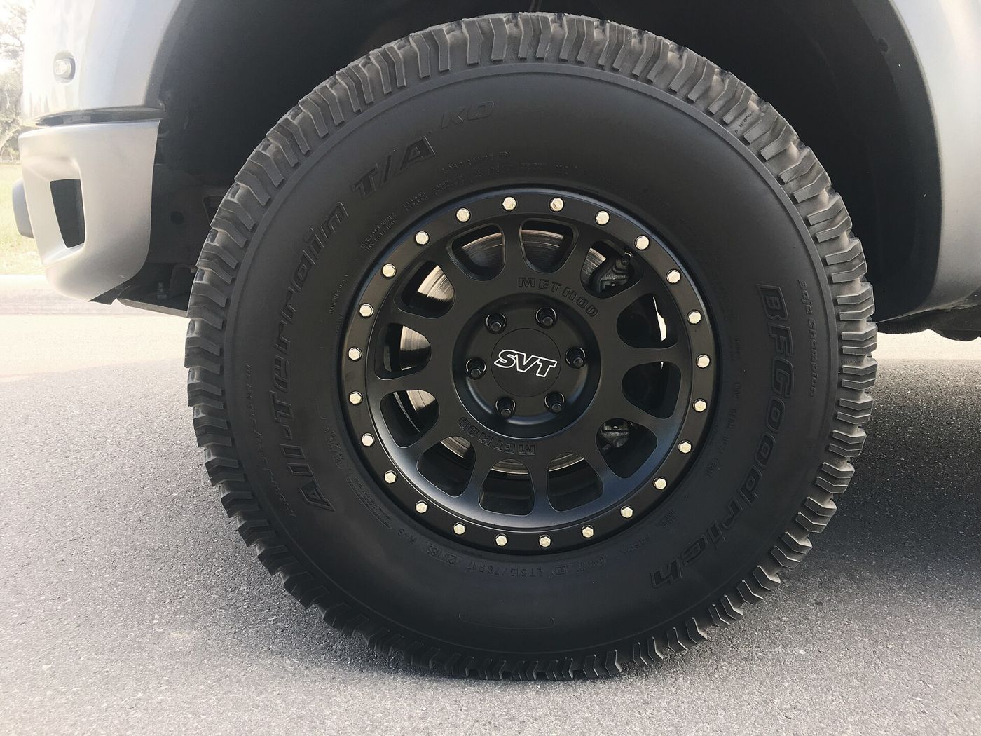 BFGoodrich All-Terrain T/A tire on a black off-road wheel, close-up